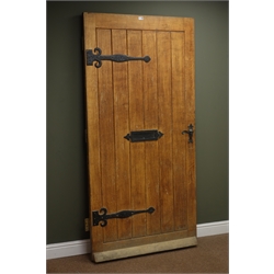  Oak exterior door, framed planked construction with hammered black finish ironmongery including letter box and handle, W95cm, H195cm, D4cm  