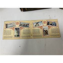 No 2 model Ellams Duplicator Ban Tam, together with a leather bound photo album and a 'Wills's cigarette card Album' full of cigarette cards