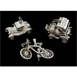 Three silver pendant / charms including rickshaw, bicycle and classic car