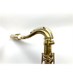 Brass tenor saxophone by Adolphe SAX, 84 Rue Myrha, Paris,  No.938 serial number 12097, H75cm excluding crook; in hard carrying case bearing plaque for Henri Selmer