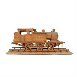 Scratch built wooden model of LNER steam locomotive no. 4219, on wooden display track, H21cm