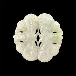  Chinese jade disc, of lobed circular form, pierced and engraved, carved in the form of two lotus, D5cm