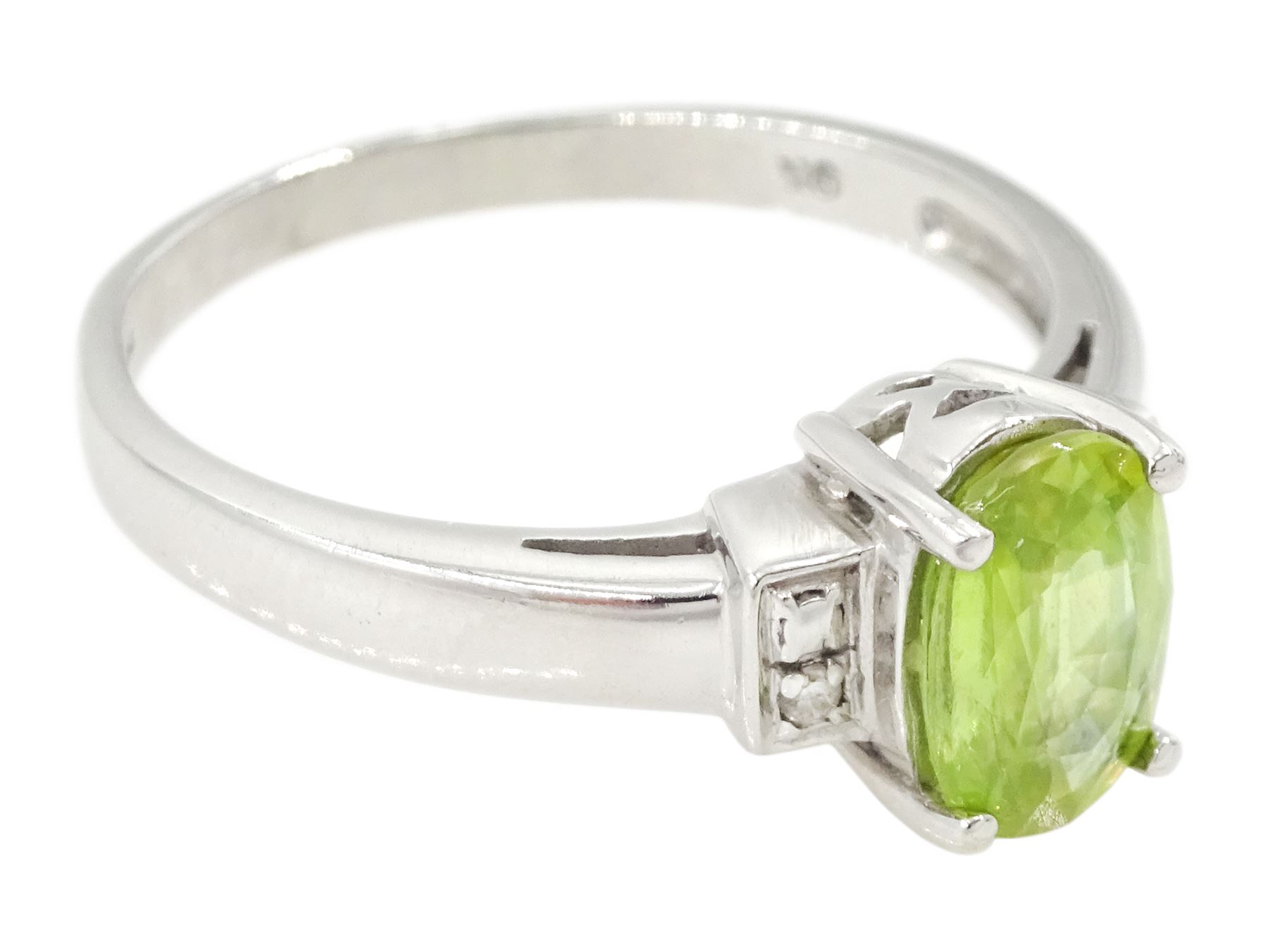 9ct white gold three stone oval cut peridot and diamond ring, hallmarked
