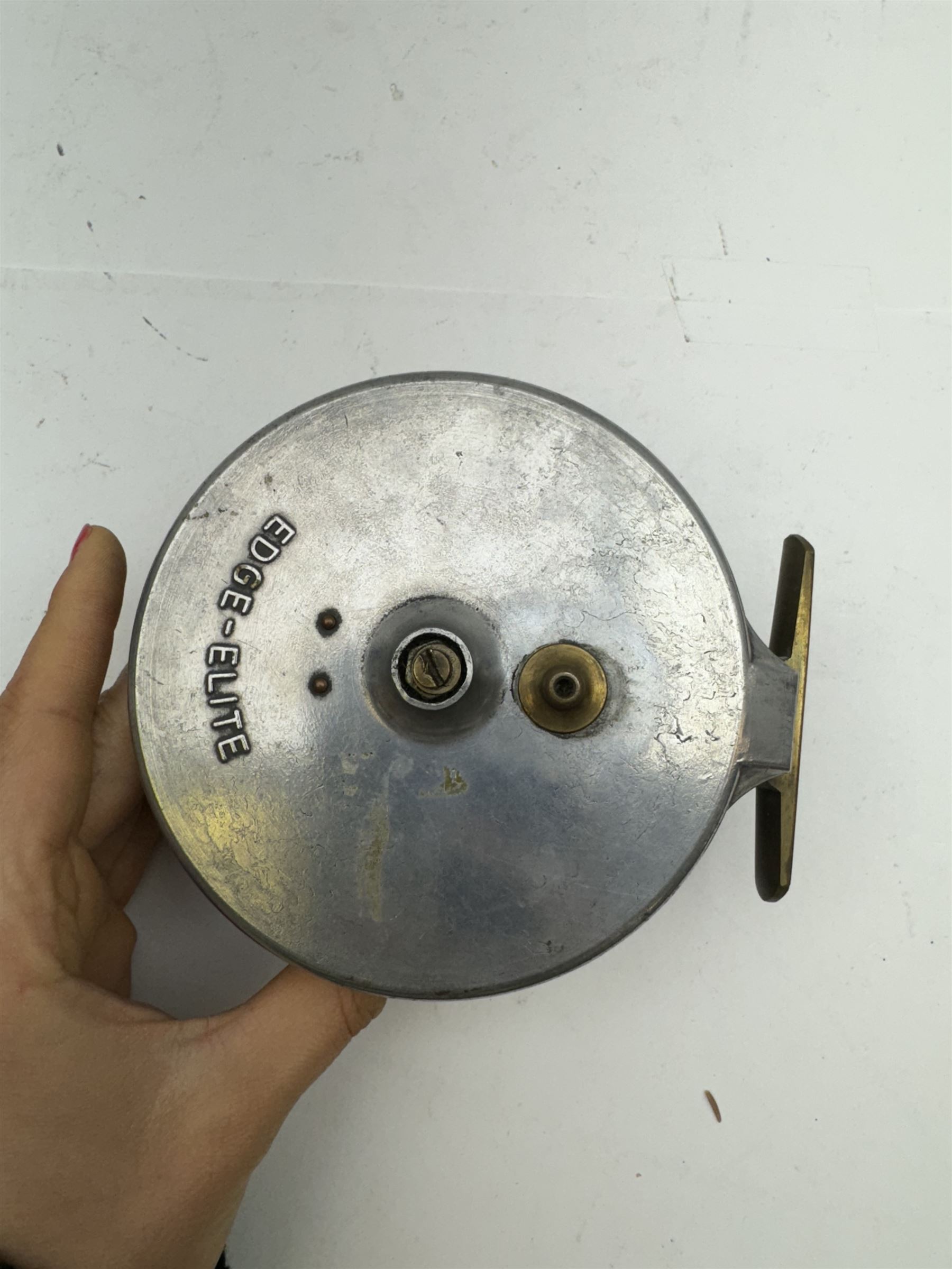 D. Slater, Newark, wood, alloy and brass star-back centre pin reel,  together with three other wooden/alloy reels including Edge Elite, Milbro Pelican and one other 