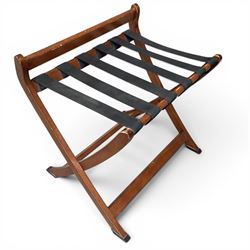 Ten walnut finish folding luggage stands