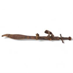 African Sudanese side-arm dagger with brass handle with cross detail, in leather scabbard, together with a collection of swords 