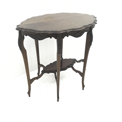 Early 20th century shaped walnut centre table, floral carved cabriole legs joined by single undertier, W80cm, H72cm, D53cm