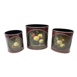 Three hand painted waste paper bin with floral decoration, tallest example H31cm