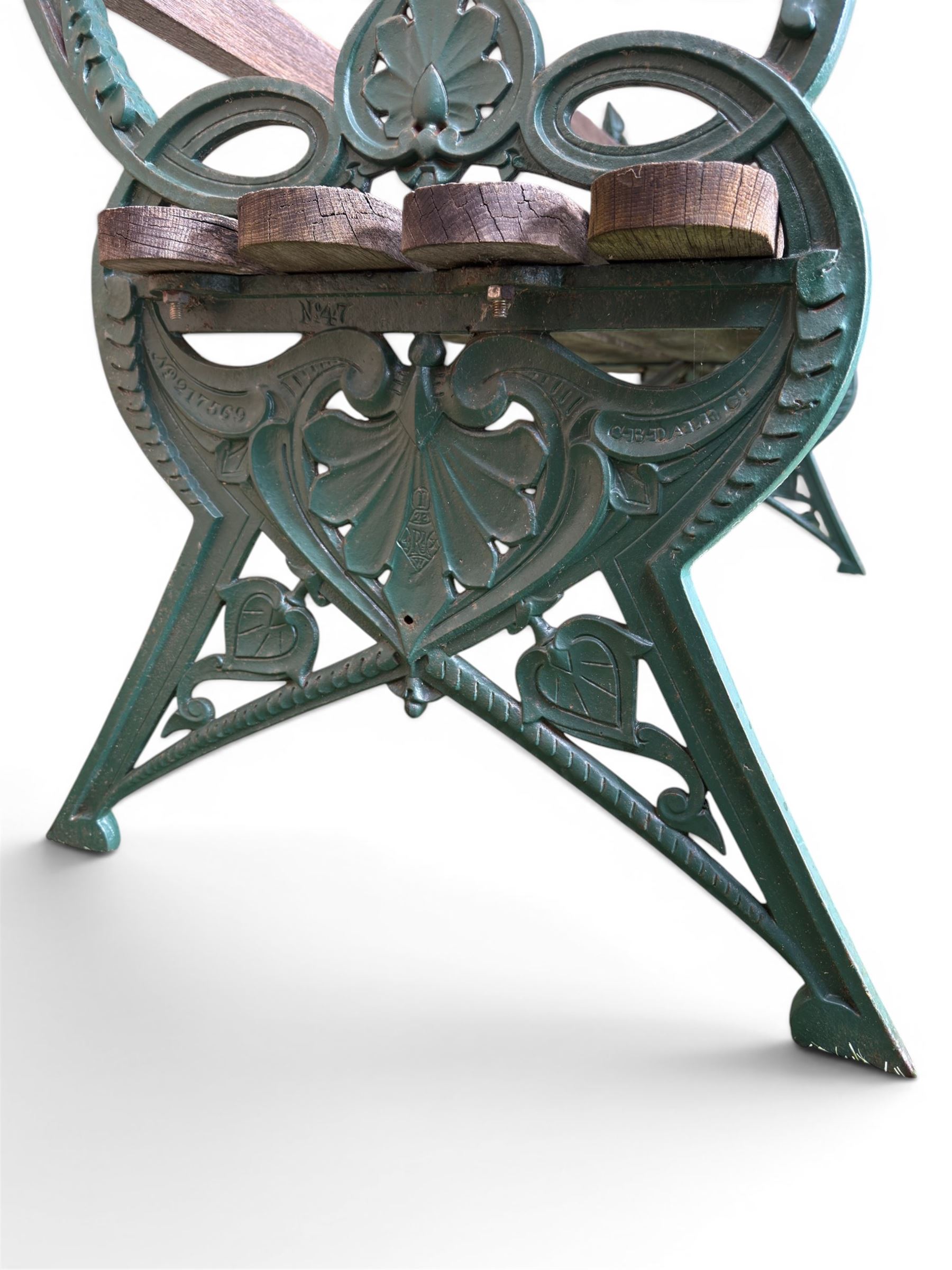 Coalbrookdale - Lily Pad design cast iron an wood slatted garden bench, late 19th century Aesthetic Movement, no. 217569, painted in green with iron centre support and seat stretcher, hardwood slatted