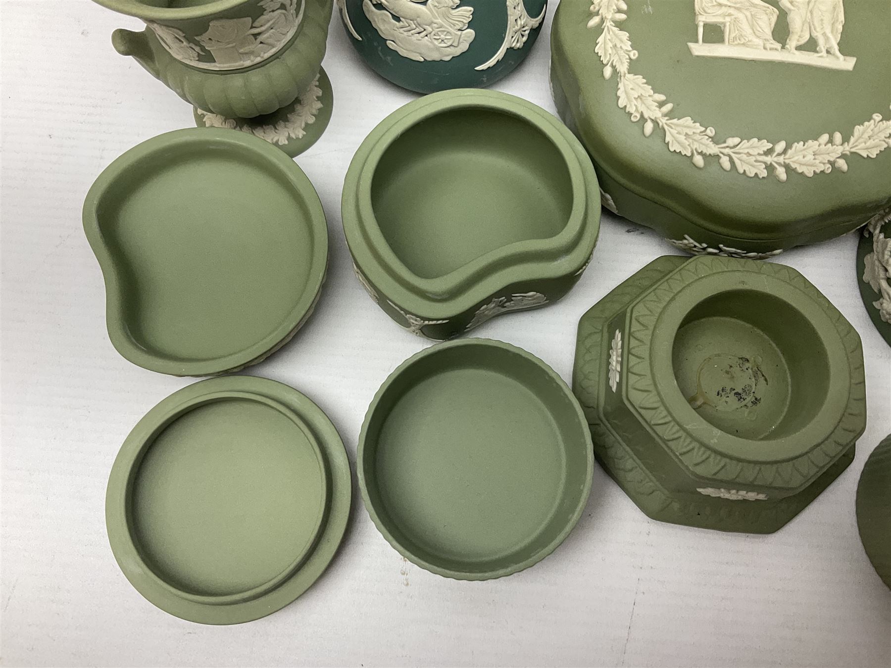 Collection of  Wedgwood green Jasperware, to include large jug, vases, trinket dishes, etc together with two teal Jasperware vases 