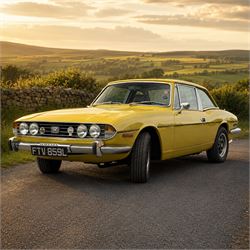 1973 Triumph Stag Mk II 3.0 V8 Manual with Overdrive

Registration: FTV 859L
Date of first registration: 8th March 1973
Recorded mileage: approximately 50,000 miles
Engine: 2,997cc petrol V8
Transmission: four-speed manual with overdrive

An attractive manual-overdrive example of Triumph’s celebrated V8 grand tourer, finished in yellow and supplied with both a removable hardtop and folding soft top.

The car has been the subject of extensive restoration and mechanical work, supported by a large history file containing invoices, notes and photographs documenting the work undertaken. The accompanying records indicate that the engine was rebuilt at approximately 36,000 miles, including re-boring of the block, checking and machining of the top faces, and steam cleaning following machining.

Further work and replacement parts are understood to include an upgraded radiator, electric cooling fan, Stag Webber header tank kit, complete set of cooling hoses and clips, fuel pump and filters, alternator, distributor cap, HT leads, spark plugs, front brake calipers and hoses, rear brake cylinders, tyres, front lights and LED bulbs. Various seals, interior trim items and seat components have also reportedly been renewed.

The car is believed to have been dry-stored from 1994 until 2017, with a substantial programme of recommissioning and improvement subsequently undertaken between 2017 and 2023. The history file also includes earlier MOT certificates dating from 1988 to 1994.

Offered with its V5C, hardtop, soft top, extensive restoration and maintenance history, photographic record and a quantity of useful spare parts, including a new dashboard veneer set.