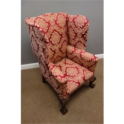  Queen Anne style wingback armchair, walnut framed, upholstered in Damask fabric, acanthus carved cabriole supports with ball and claw carved feet, W75cm, H115cm  