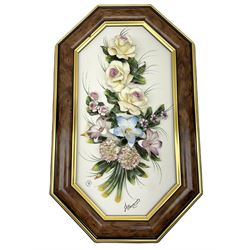 Set of three Capodimonte wall plaques, depicting floral decoration in octagonal frames with gilt edging, largest plaque H48, two small plaques H31cm.    