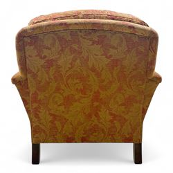 Duresta - Contemporary pair of upholstered armchairs, in red and gold damask style fabric, each with sprung seat and removable cushion back, rolled arms, on turned front supports with brass castors, square back legs 
