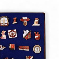Twenty-one Manchester United enamel pin badges, including 1968 European Cup Winners example and a 1977 FA Jubilee Cup Winners example