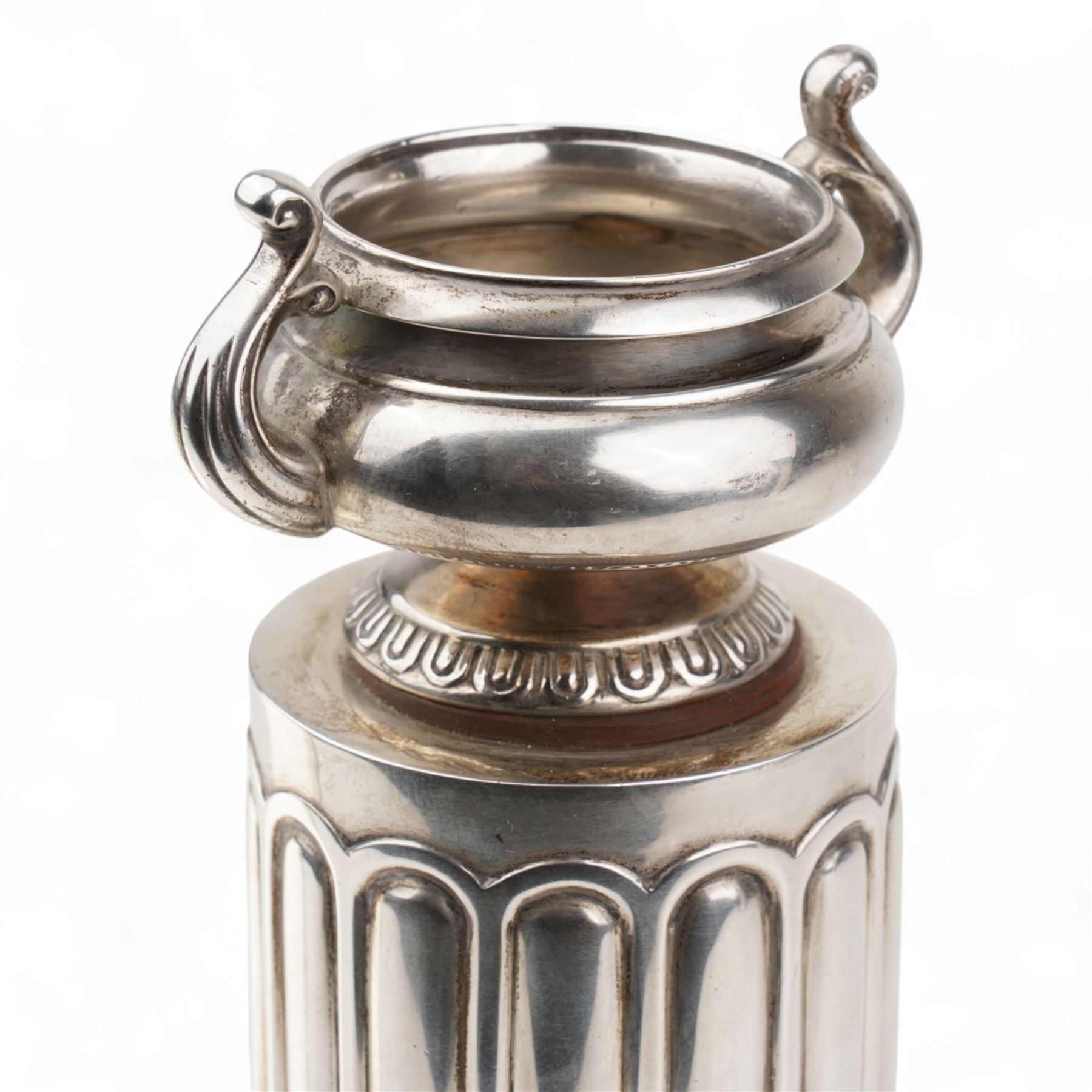 Silver Aagdan in the form of a two handled urn on a fluted circular pillar marked Sterling  Silver K.P.D. H16cm
