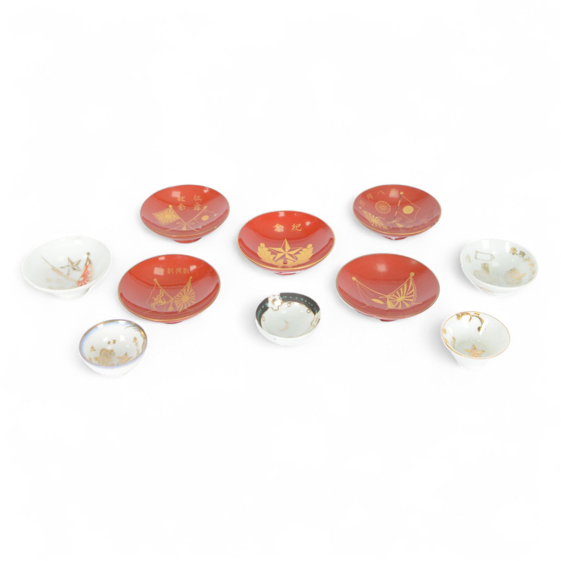 Five red lacquered saki bowls, together with five porcelain examples, red lacquered D9cm
