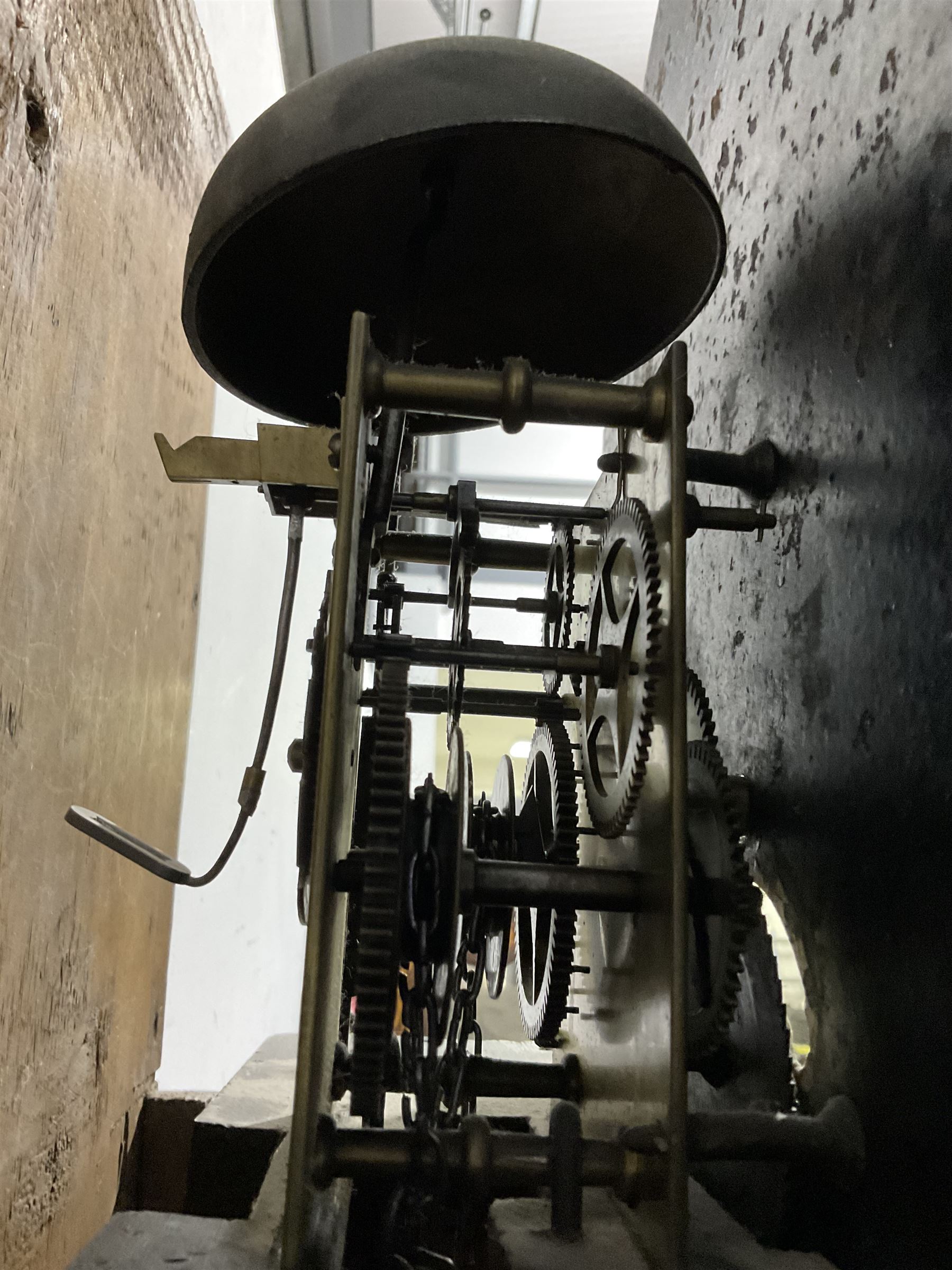 Michael Johnson of Barnard Castle (Yorks) - 30hr oak cased longcase clock c1820, with a swan necked pediment and central finial, break arch hood door flanked by turned pilasters, trunk with canted corners and a long door with a concave shaped top, on a rectangular plinth with a shaped base, painted dial with Arabic numerals, makers name, brass stamped hands and date aperture, countwheel striking, chain driven movement striking the hours on a bell.