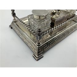 Egyptian Revival style desk stand, with pen tray and two glass inkwells, upon four bracket feet, W23cm