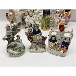 Collection of Victorian and later Staffordshire style figures, to include Queen Mary on horseback, child riding a goat, spill vases, the royal children etc, Queen Mary H26cm 