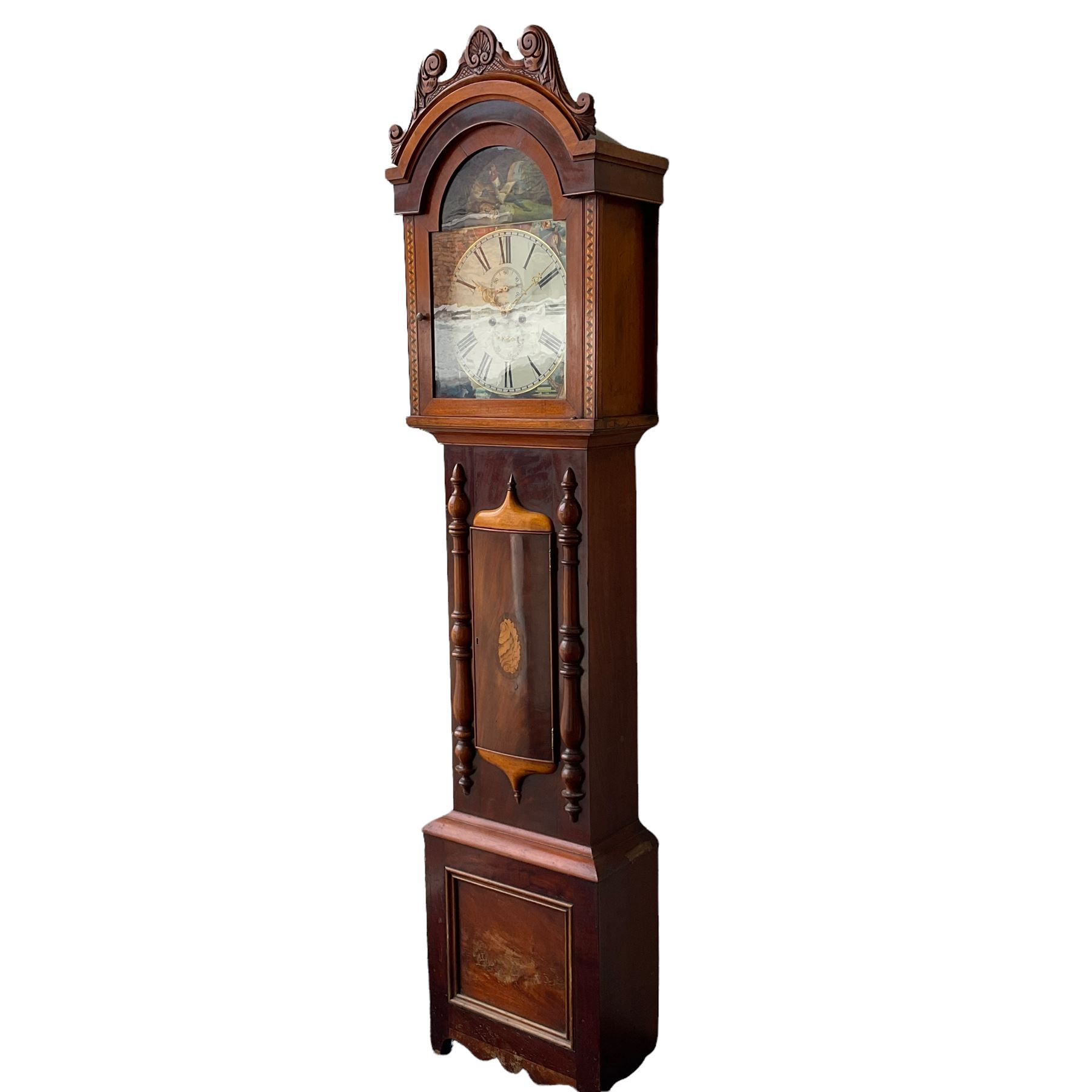 A Scottish longcase clock c 1890 in a contrasting light and dark mahogany veneered case, hood with a carved and crested pediment with a break arch door flanked by inlaid parquetry work, with a short trunk door and applied cushion mouldings, door flanked by half-turned applied columns on a square pediment with a recessed panel, fully painted break arch dial with spandrels representing the united kingdoms of Scotland, England, Ireland and Wales with a depiction of Robert Bruce to the arch, dial with Roman numerals ,minute track, subsidiary calendar dial and seconds dial with matching stamped brass hands, dial inscribed “J Cuthill, Beeth”, with an eight day striking movement,  striking the hours on a cast bell. With pendulum and two flat weights. 
John Cuthill is recorded as working as a watchmaker and clockmaker at 36 Eglington Street, Beith, Ayrshire. 1893.  
