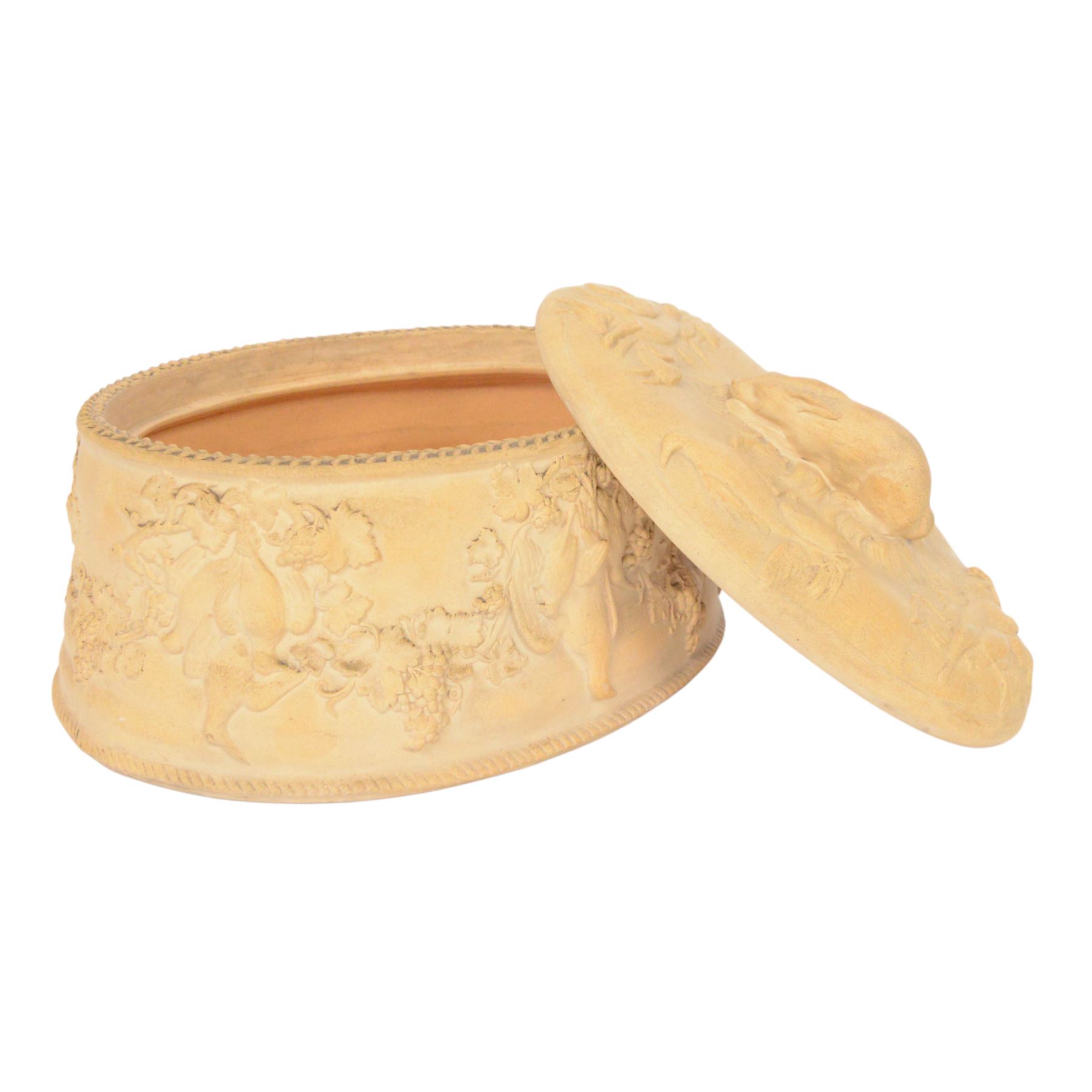 Wedgwood caneware game tureen, the cover with rabbit handle surrounded by country animals, repeating moulded leaf rim, the external sides decorated in light relief with dead game among vines, impressed marks to base, W26.5cm 