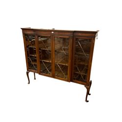 Georgian design mahogany breakfront bookcase, fitted with four astragal glazed doors enclosing shelves, raised on cabriole supports with pad feet 