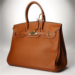 Hermès - gold hardware 'Birkin 35' handbag in gold Togo leather with white stitching, featuring gold-plated hardware, double rolled handles, front flap, belted turn-lock closure, and leather lining with one zip and one slip pocket, stamped 'Hermes Paris Made in France' in gold, with blind-stamp Q (2013) with craftsman’s code 70A to the underside of locking belt. Accompanied by: padlock, keys, clochette, Hermes dust bag, booklet, and ribbon. New unused condition.