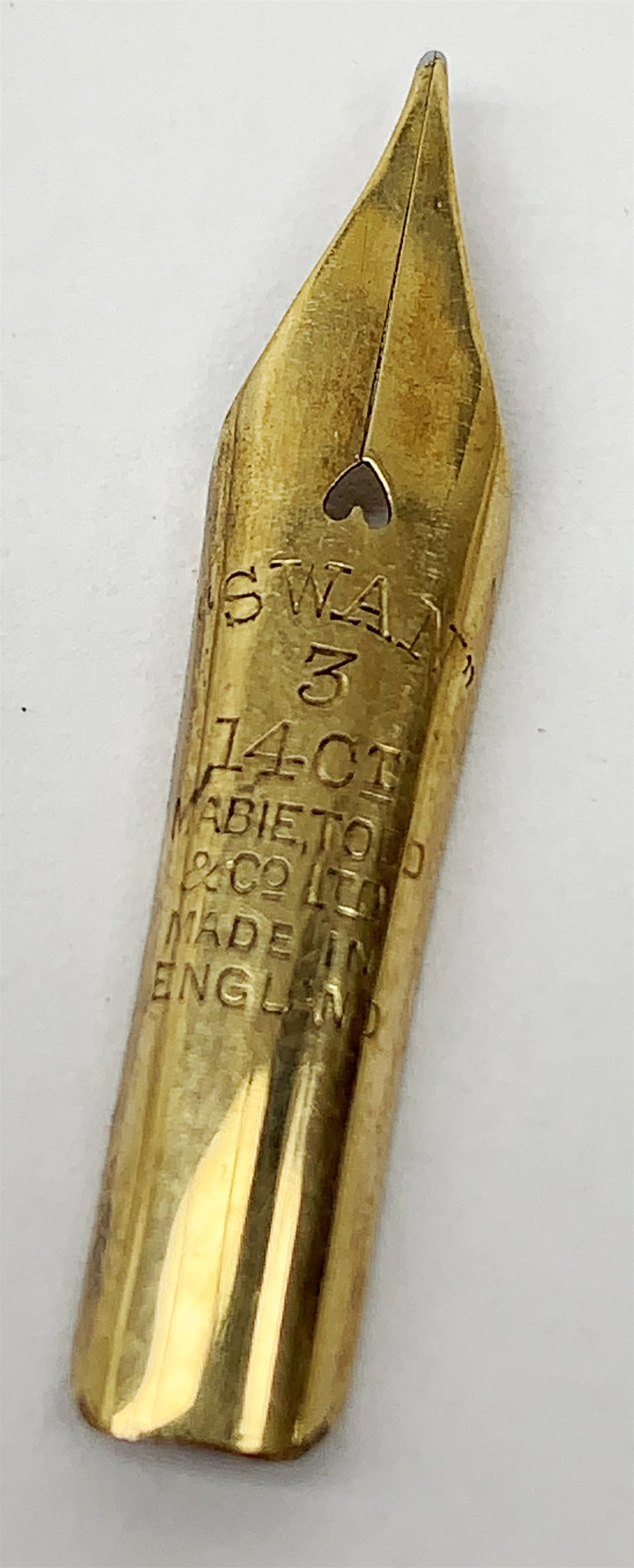 Two Victorian bone Stanhope pens with letter opener terminals, together with two further bone Stanhope pens (a/f), and two Victorian vegetable ivory Stanhope barrel tape measures. 