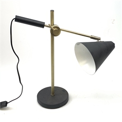 Brass and black finish adjustable desk lamp with cone shaped shade,  on circular base, H72cm max