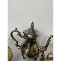 Two Capodimonte teapots, with floral decoration together with a silver plated coffee service