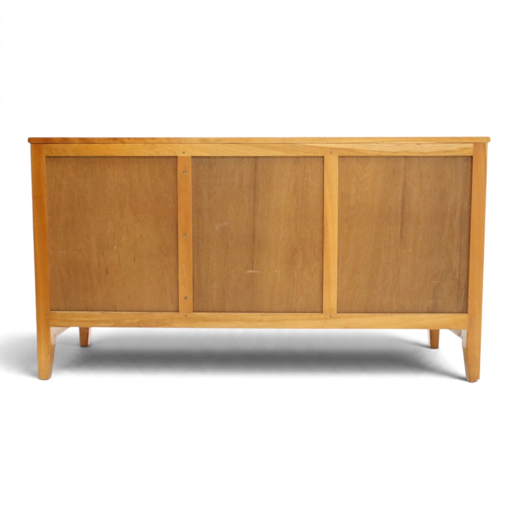 Traditional cherrywood sideboard, rectangular top above three fielded panelled drawers, three cupboard doors with triple panelled doors, brass knobs and hinges, tapered supports