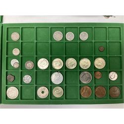 Coins and medallions including, York 1811 one shilling cattle and barber silver token, United States of America 1883O silver Morgan dollar, birds of destiny medal by Malcolm Appleby, Great British King George V 1930 halfcrown, King Edward VII 1902 silver medal, King George V 1916 halfcrown etc, housed in a case with lift out green coin trays
