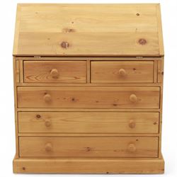 Contemporary waxed pine bureau, fall front enclosing fitted interior with pigeonholes and drawers, over two short and three long drawers with turned wooden knobs, on plinth base