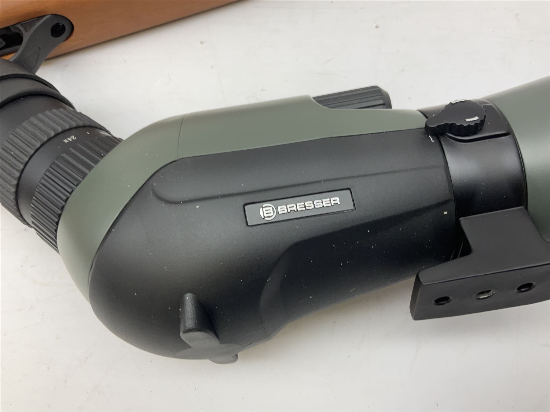 Hatsan .22 break-action air rifle retailed by Edgar brothers with 46cm barrel including fully integrated sound moderator, No.092031501; L113cm overall; in gun sleeve; together with Hawke Vantage 2-7x32 telescopic sight, Bressler Condor 24-72x100 spotting scope with carrying case and Velbon EF-61 tripod; all boxed (4)