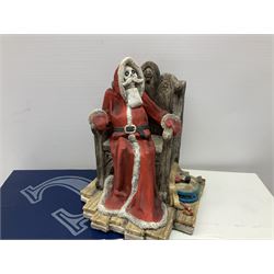 Terry Pratchett Discworld figures, designed by Clarecraft, comprising Lias Bluestone DW82, Hogfather DW72, Granny Weatherwax, boxed, DW06, Ridcully DW61and 'Ironcrust's genuine dwarf bread'.