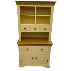 Cream and oak dresser, fitted with five drawers, two cupboards and open shelves 