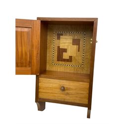 Metamorphic library chair (W37cm, H88cm); craftsman-made wall cabinet with inlaid interior (W32cm, H59cm)