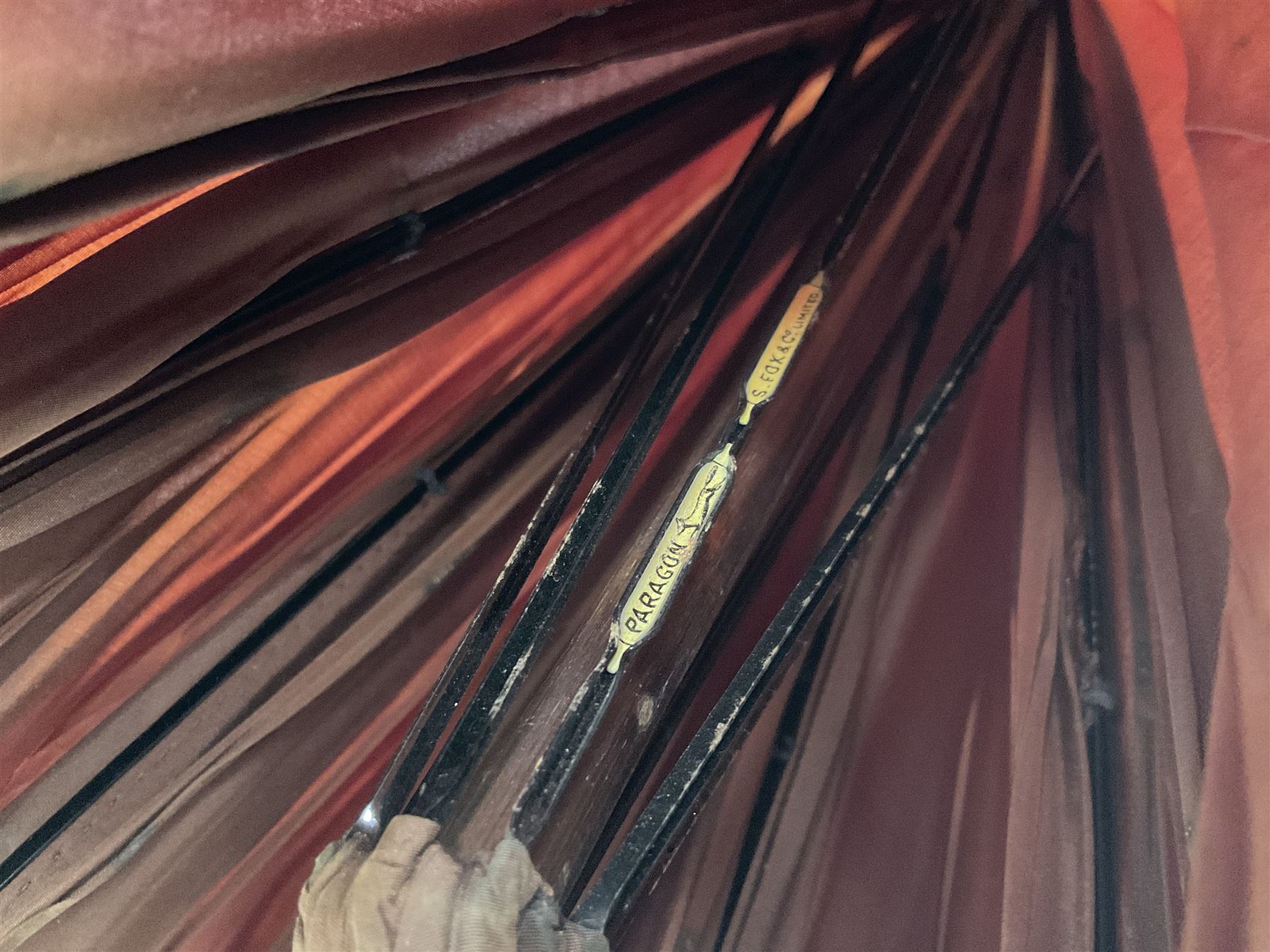 Edwardian novelty parasol by Briggs of London, the bamboo shaft with brown fabric canopy, and silver mounted terminal concealing a silver mounted pencil, hallmarked Charles Henry Dumenil, London 1904, also marked Briggs, H93cm