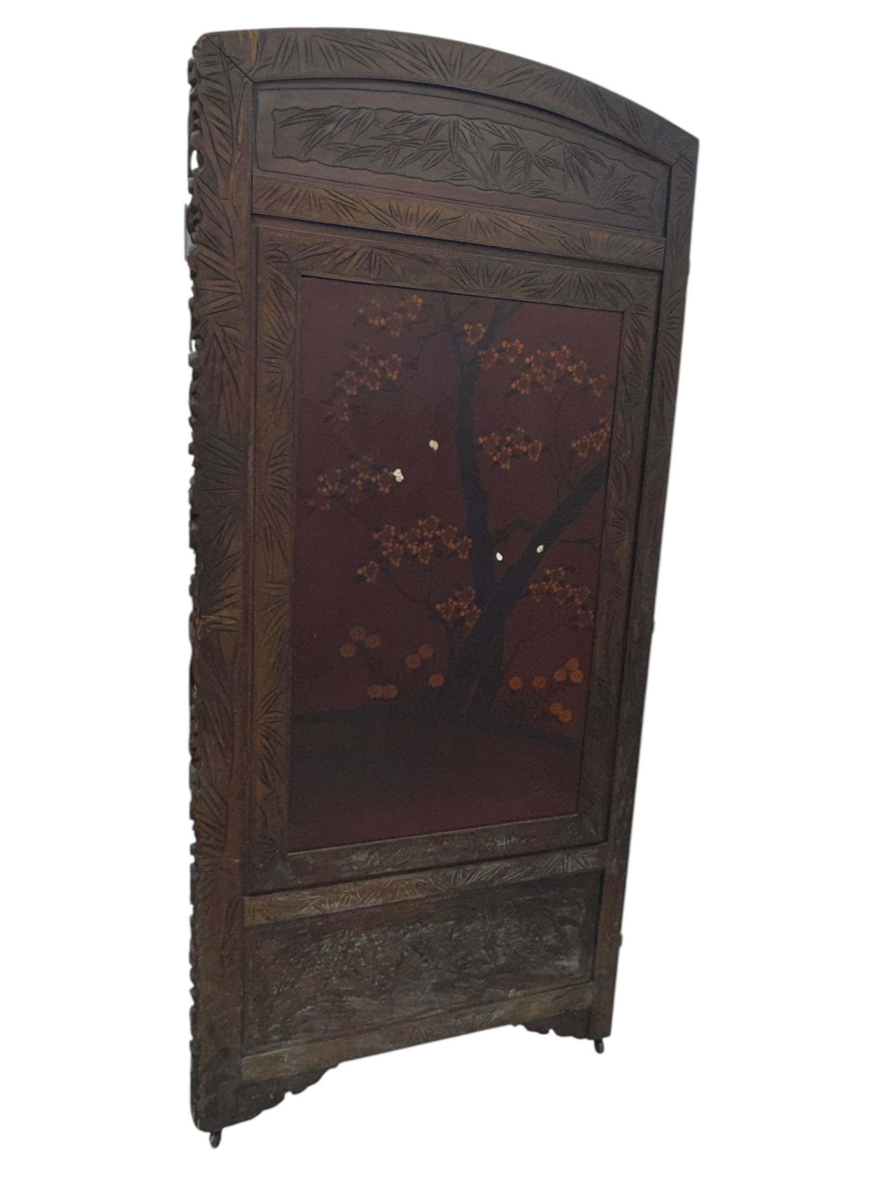 Meiji period (1868–1912), Shibayama lacquer carved hardwood two-fold screen inlaid with mother-of-pearl, bone, and ivory, decorated on one side in high relief and inlaid in a  Shibayama manner with oriental storks flying below flowering branches,  the reverse lacquer panels depicting flowering cherry trees. This item has been registered for sale under section 10 of the APHA Ivory Act.