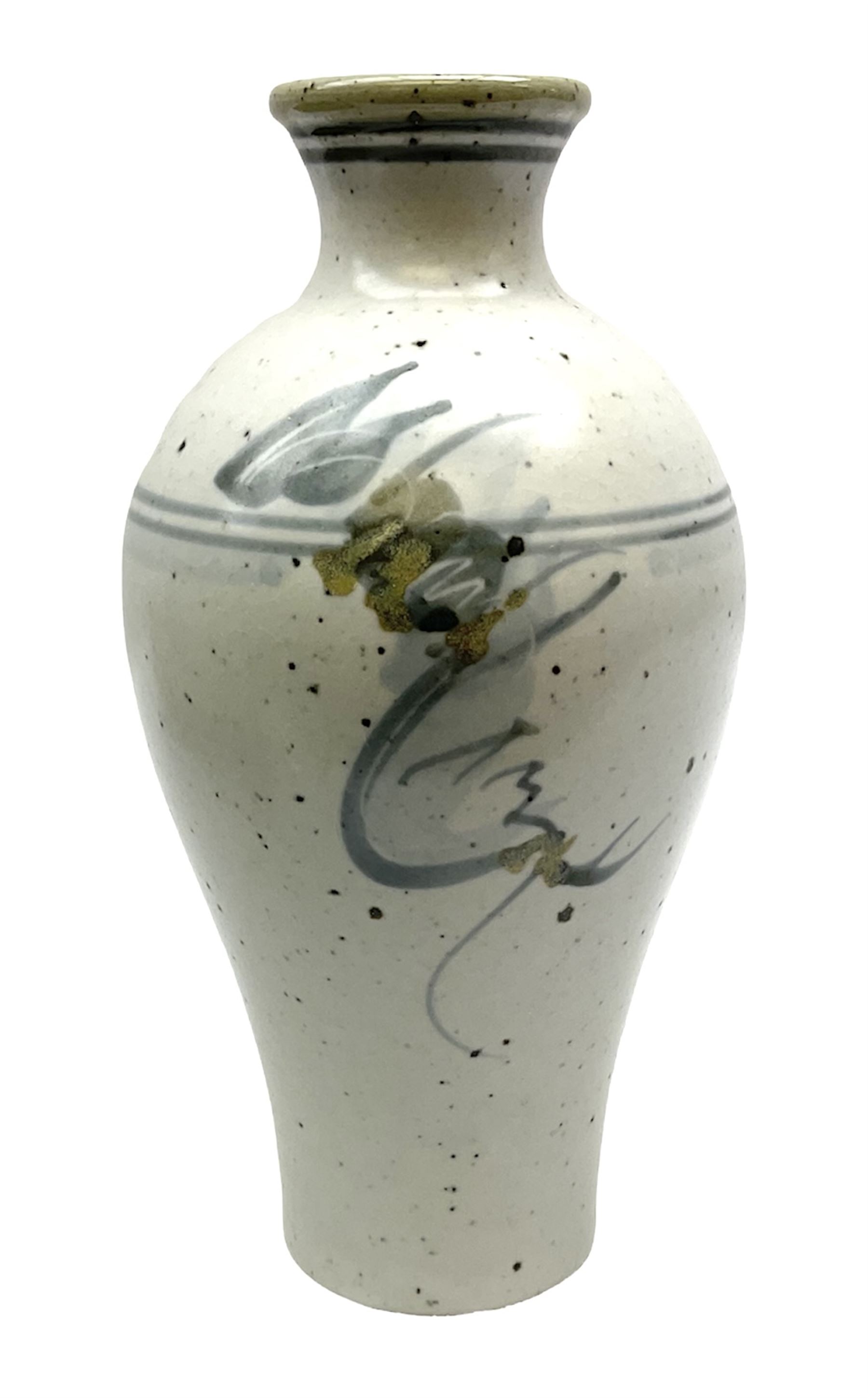 Studio pottery vase of baluster form with a light mottled blue ground with abstract painted decoration, H26cm