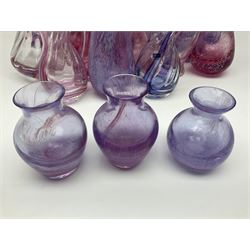 Collection of pink/purple Caithness glass vases, to include mottled and swirl designs, largest 20cm (19)