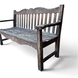 Teak garden bench, wavy shaped rail and slatted seat, with matching coffee table (2)