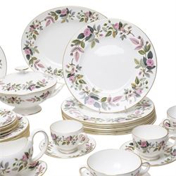 Wedgwood Hathaway Rose pattern tea and dinner wares, comprising two covered tureens, two oval serving dishes, eight dinner plates, eight dessert plates,  six side plates, eight soup bowls and stands, four teacups and saucers, and a sauce boat and stand