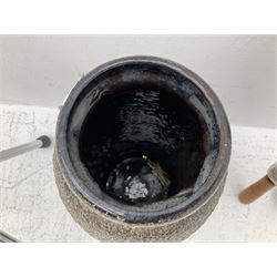 Two smooth polished ram horn handled Shepherd's crooks and a further similar example, together with various shooting sticks, walking sticks and canes, housed in a volcanic lava glaze West German style vase