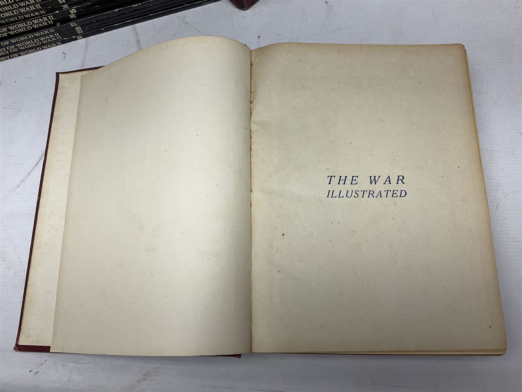 Three boxes of books, periodicals and DVDs of military interest with particular emphasis on WW2 including The History of World War Two in thirty original parts by Orbis, The D-Day Experience by Richard Holmes, The World War Two Databook, The World at War, Special Forces etc