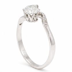 Platinum diamond crossover ring, set with two round brilliant cut diamonds and diamond set shoulders, Birmingham assay mark, total diamond weight approx 1.45 carat