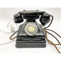 Vintage Bakelite black telephone, with chrome dial, pull out number tray and plinth H20.5cm. 