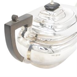 1920s silver tea pot, of oval bellied form, with Bakelite type handle and finial, hallmarked C W Fletcher & Son Ltd, Sheffield 1923, H15cm