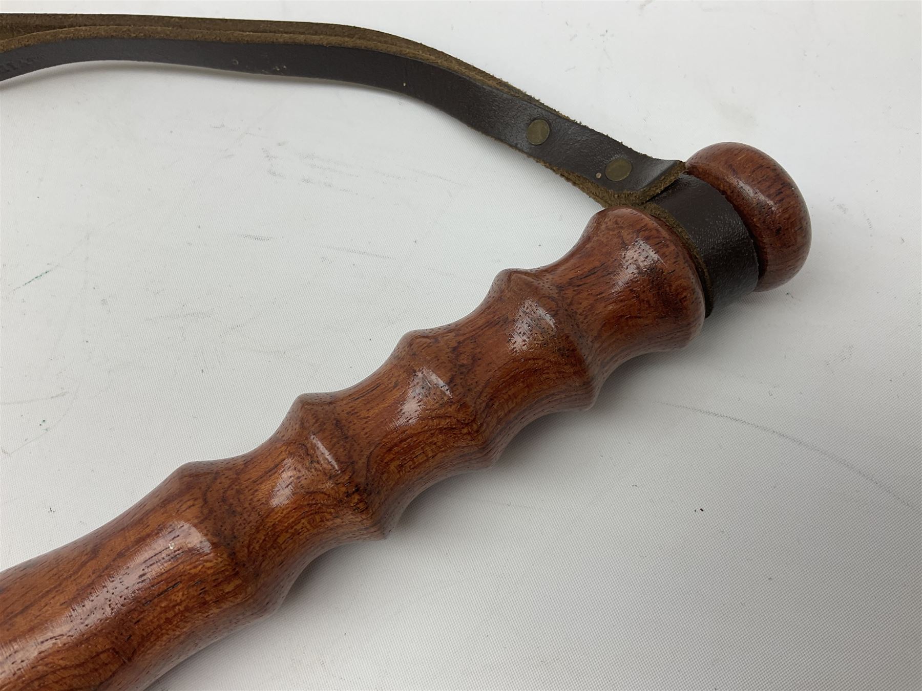 Three police turned hardwood truncheons comprising two patrol truncheons and WPC short truncheon (3)